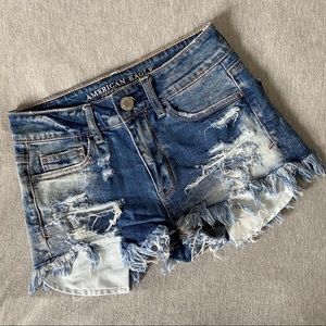 Distressed denim shorts